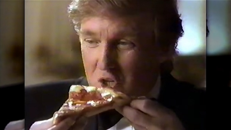 Donald trump eating pizza crust first