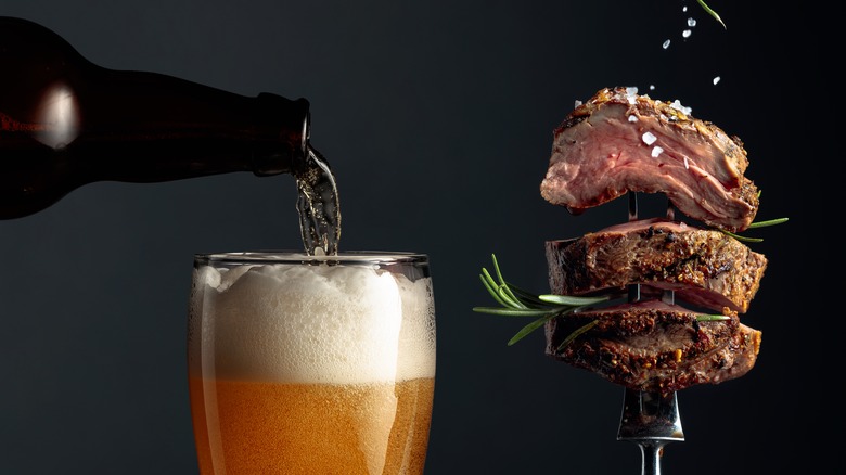 beer pouring in glass and steak on fork