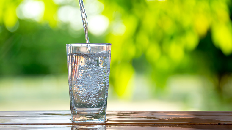 Pouring a glass of water