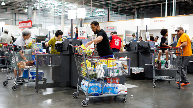 shoppers checking out at costco