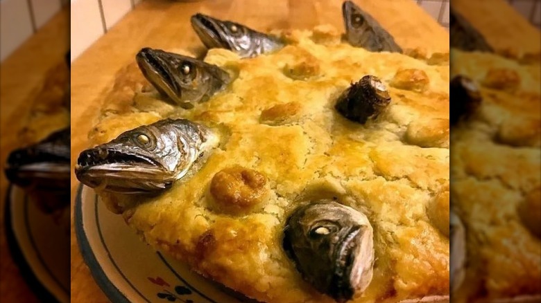 The British Pie That Has Fish Heads Poking From The Top Crust