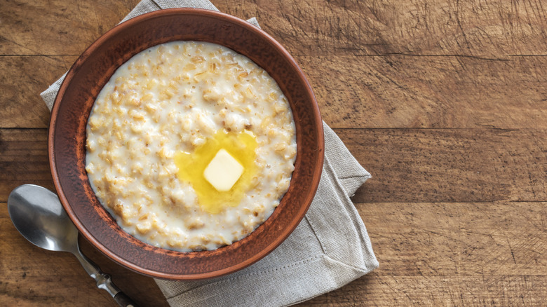 butter melting in a bowl of oatmeal 