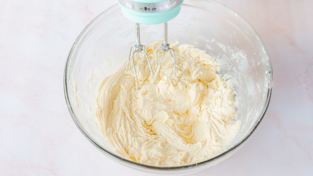 mixing frosting for Cadbury Creme Eggs cupcakes