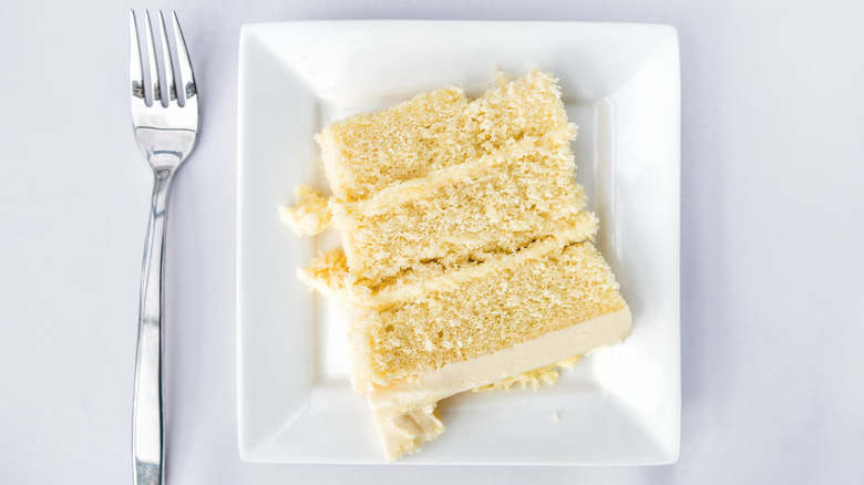 white layer cake on a plate