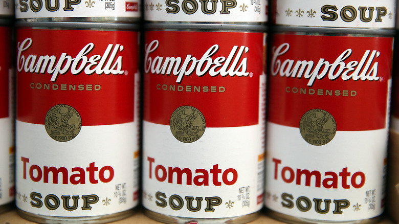 Cans of Campbell's condensed tomato soup, the same as used in the cake