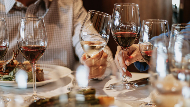 The Capital Grille people drinking wine