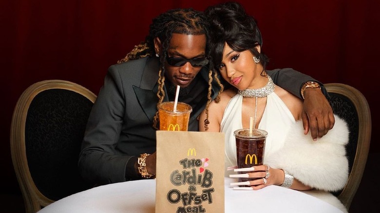 Cardi B and Offset holding drinks