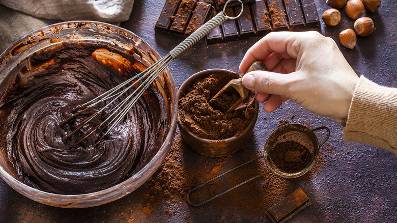 Hand stirring cake mix ingredients