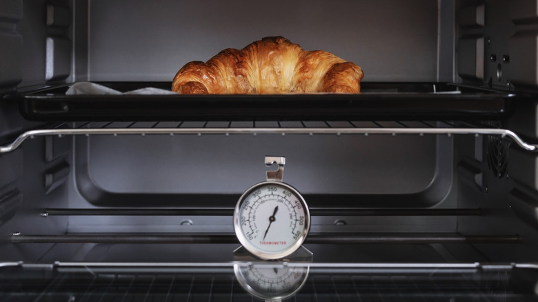 Baking croissant with a thermometer 