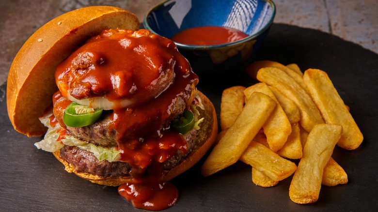 hamburger with sauce and fries 