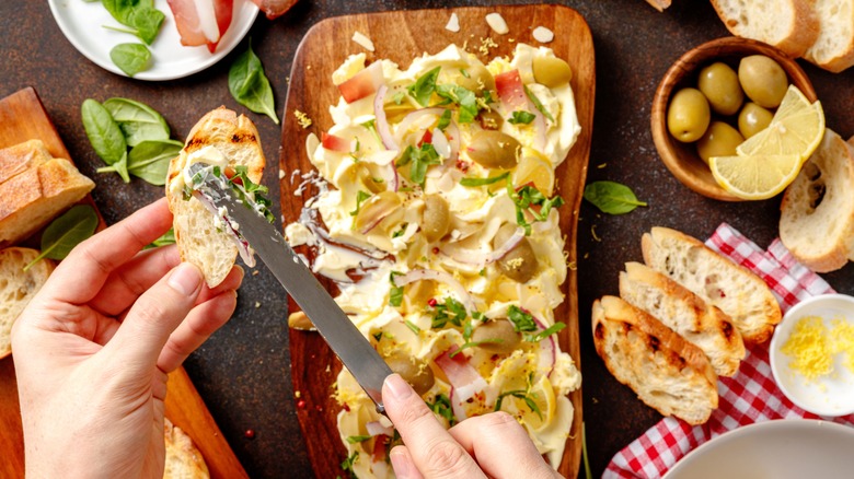 butter board with hands