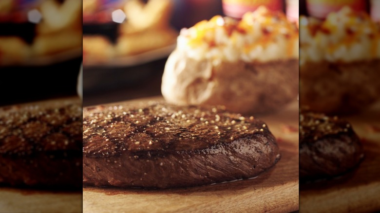 sirloin steak with loaded potato