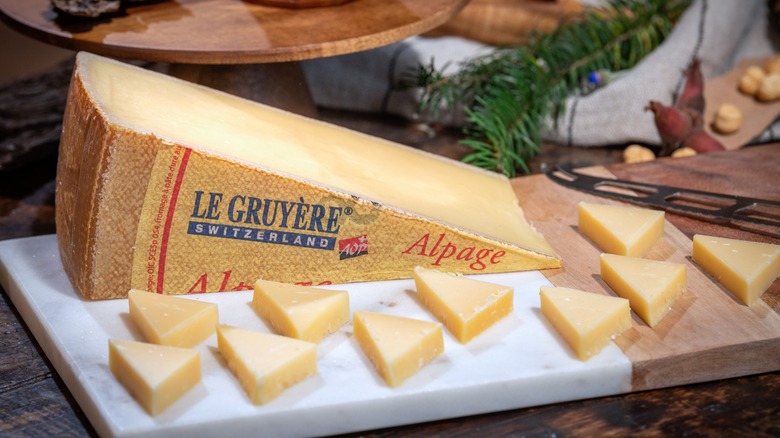 Gruyere cheese wedge and slices