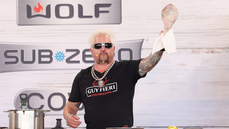 Guy Fieri in a black T-shirt