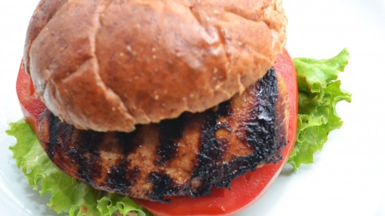 Copycat Chick-Fil-A grilled chicken sandwich with tomatoes and lettuce