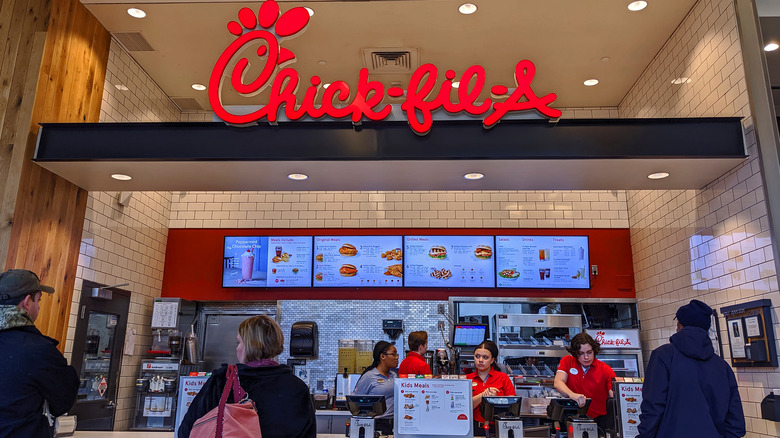 Chick-fil-A employees serving customers