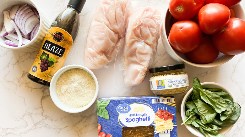 Closeup of ingredients for chicken bruschetta pasta