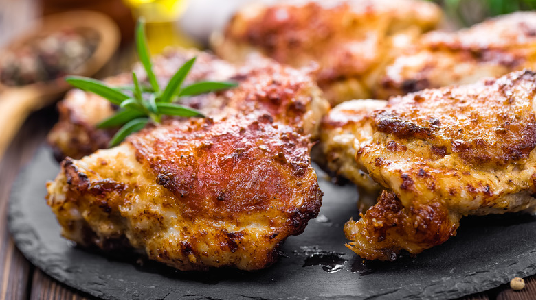 cooked chicken thighs on a plate