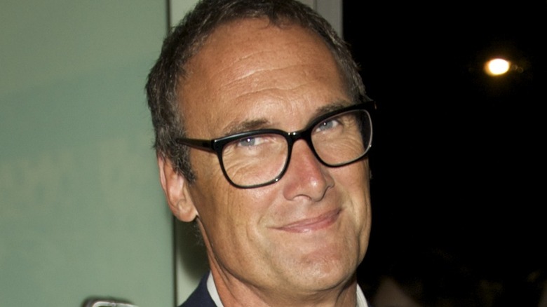 A. A. Gill wearing glasses