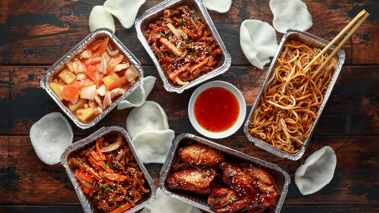 Chinese takeout with prawn crackers 