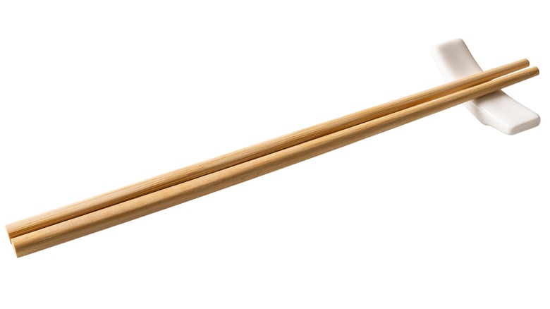 Set of chopsticks on rest