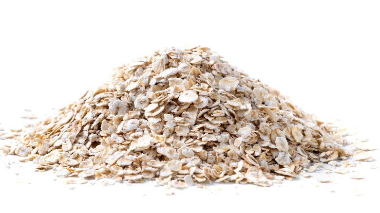 rolled oats on white background