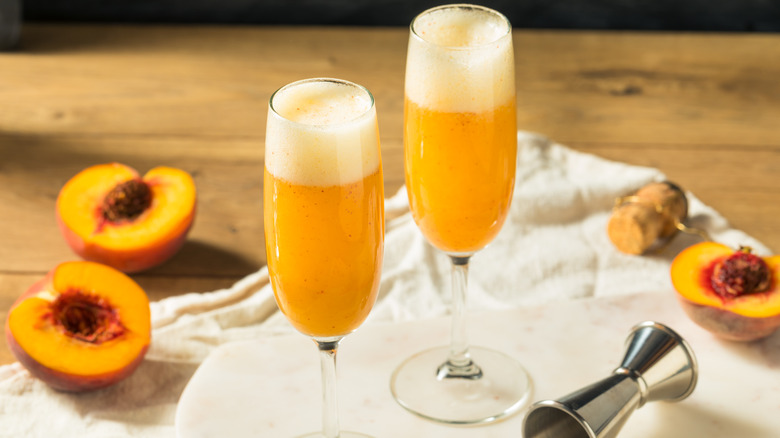 Bellinis in glasses with peaches