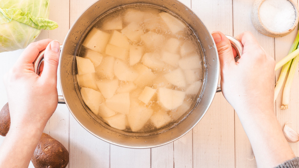 potatoes boiling in a pot