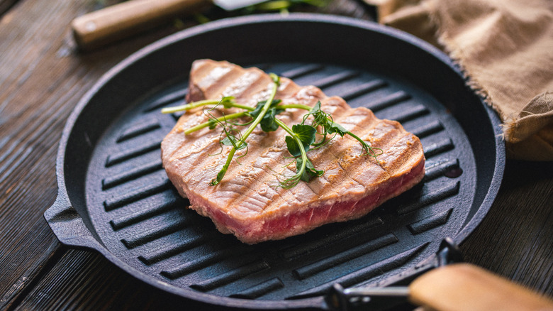 Grilled tuna steaks on plate