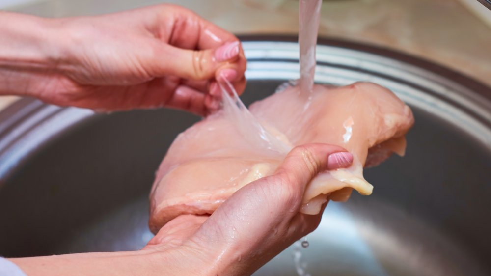 Washing chicken