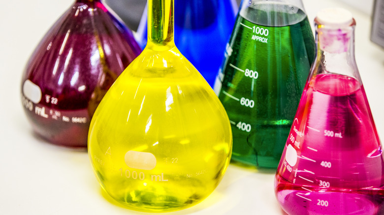 Laboratory flasks of colored dyes