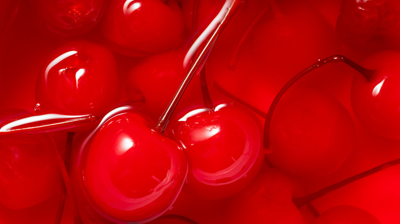 Close-up of maraschino cherries in liquid