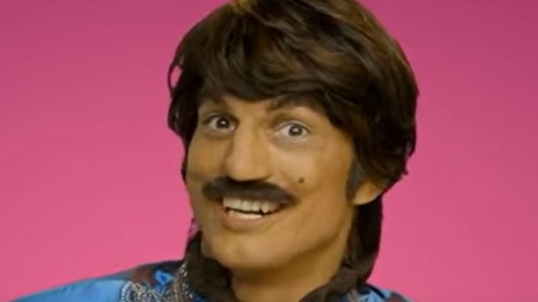 Ashton Kutcher dressed as Raj character