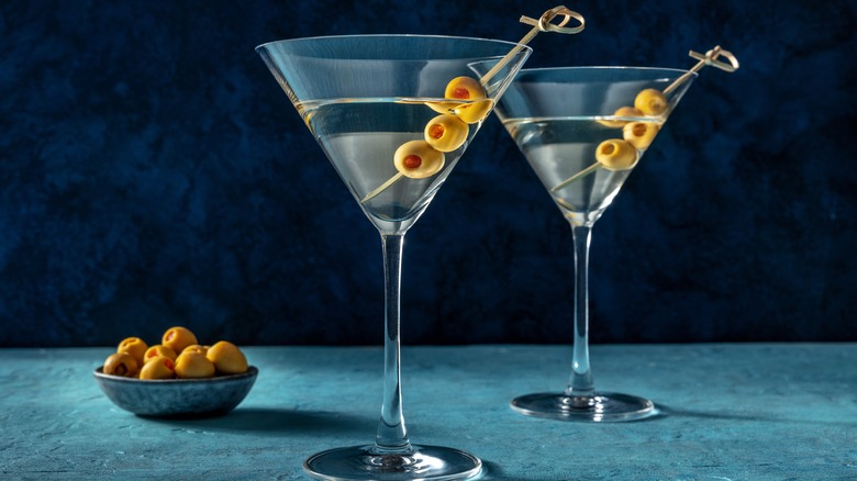 2 gin martinis with a bowl of olives