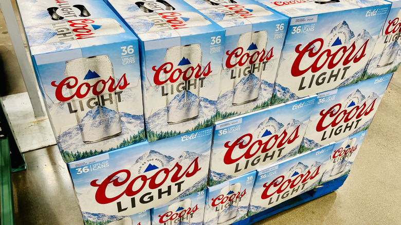 Stacks of Coors Light cases 