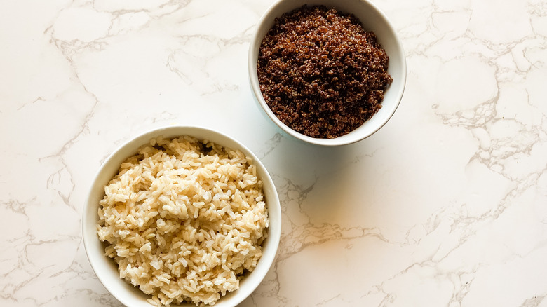 brown rice and quinoa in separate bowls