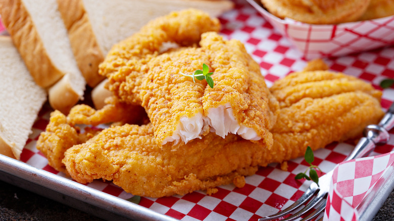 Fried catfish on checkerboard paper