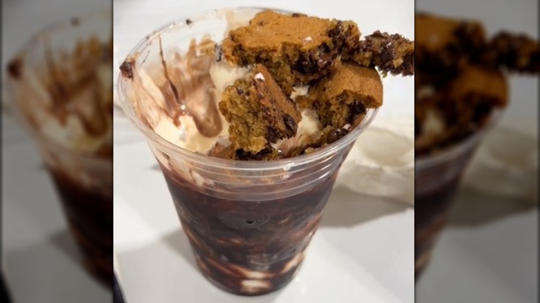 A cookie sundae made using a double chocolate chunk cookie and chocolate ice cream sundae from Costco