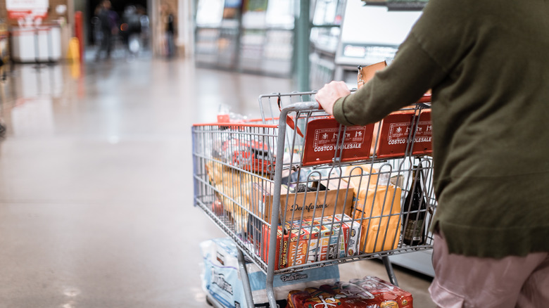 Costco shopper with full cart