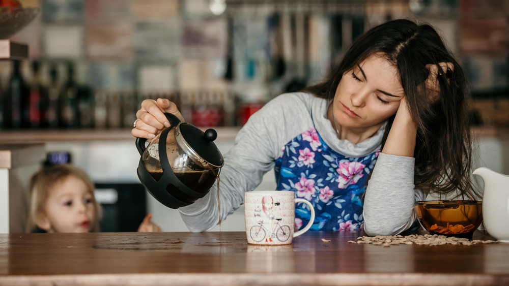 kid mother drinking coffee