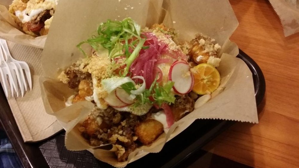 Guy Fieri eats Oxtail Chili Tots