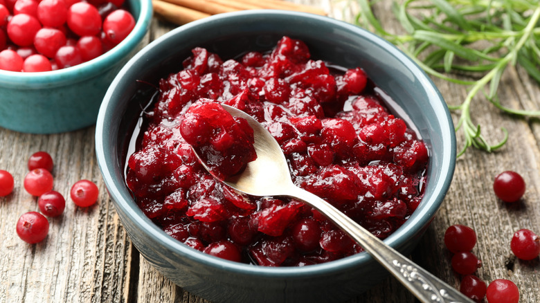 Bowl of cranberry sauce with spoon