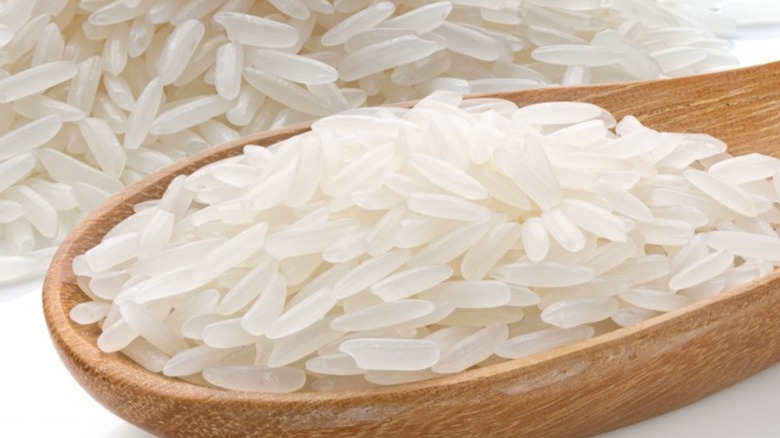 White rice in a wooden spoon