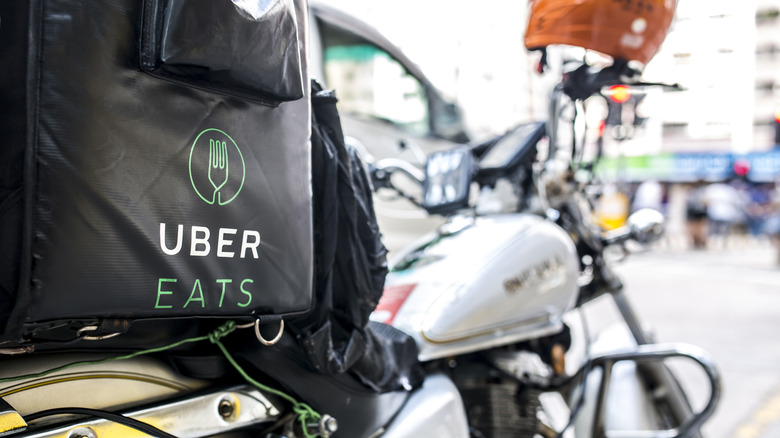 Uber Eats bag on back of motorcycle