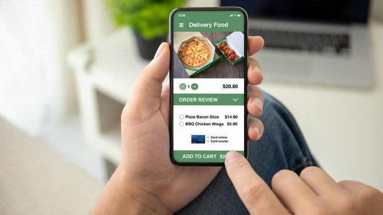 Person ordering from food delivery app