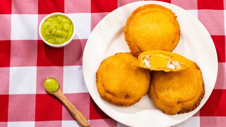 Egg arepas on a plate