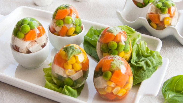 Vegetables in egg-shaped gelatin molds