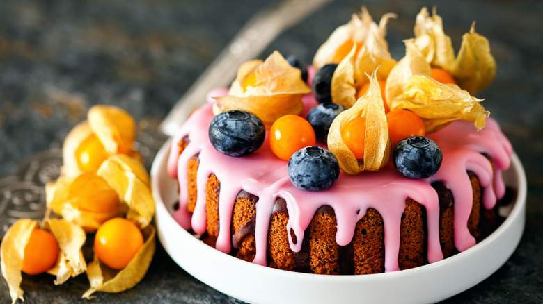 Cake with ground cherries and blueberries