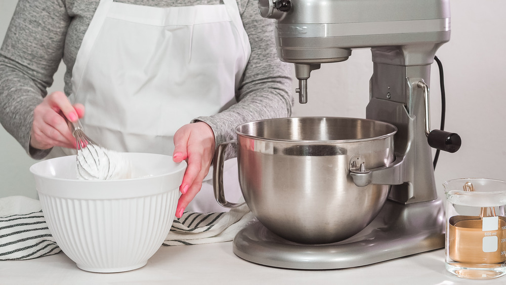 A baker using a mixer