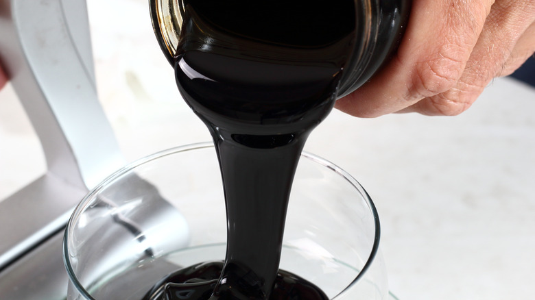 Pouring blackstrap molasses